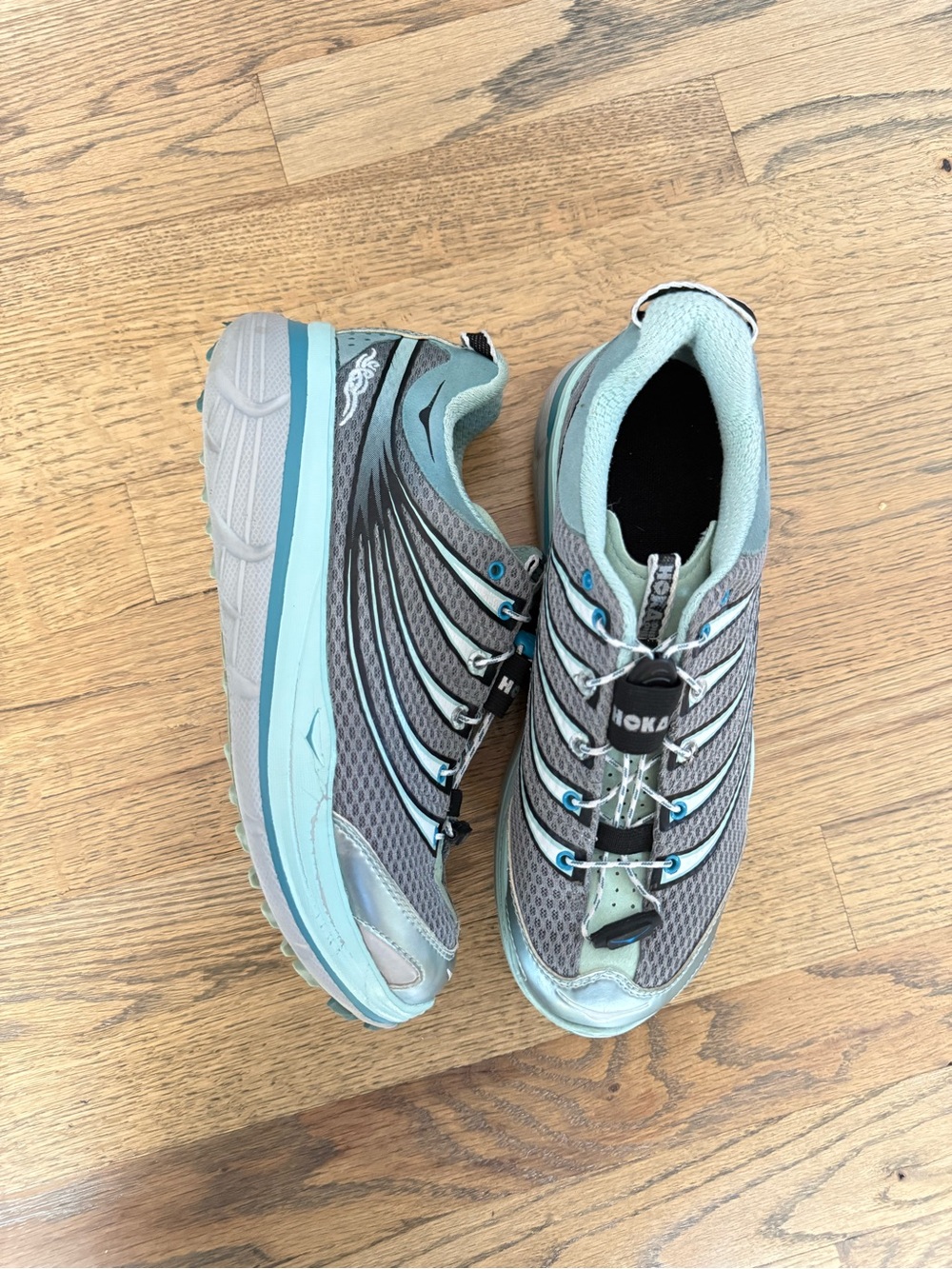 Hoka One One Women's Gray and Light Teal Trail Runners